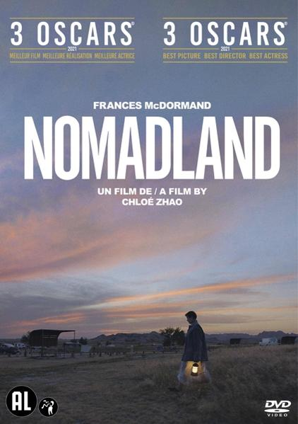 Couverture du DVD Nomadland. Une femme avec une lanterne marche dans un champ au coucher du soleil. Prix.