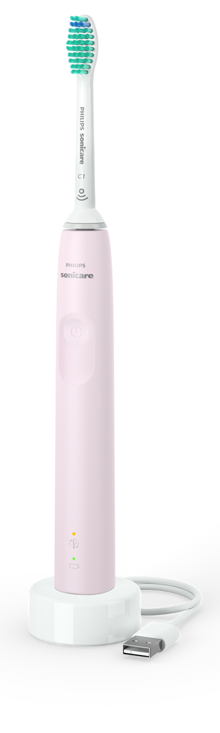 Roze Philips Sonicare elektrische tandenborstel met oplaadbasis en USB-kabel.