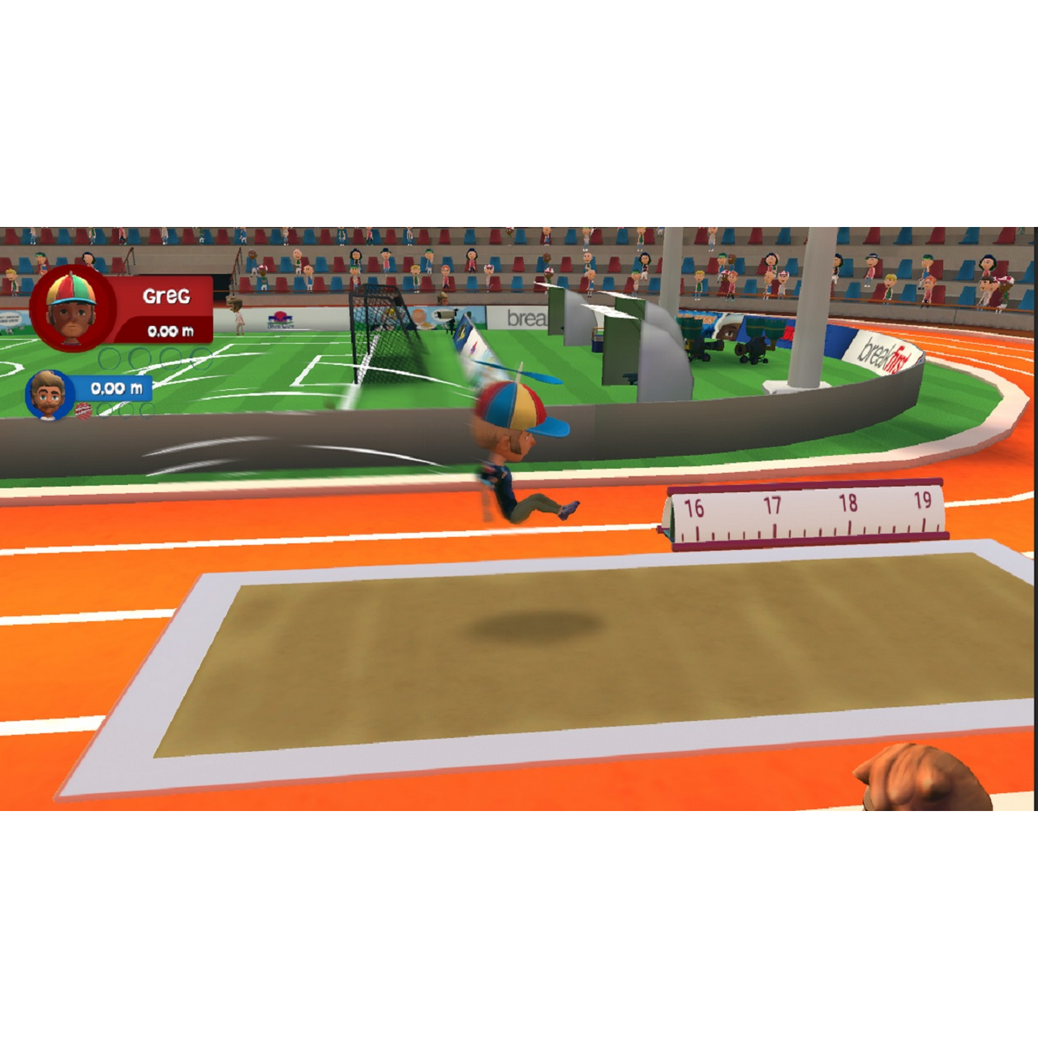 Un atleta de dibujos animados salta sobre un foso de arena en un juego deportivo.