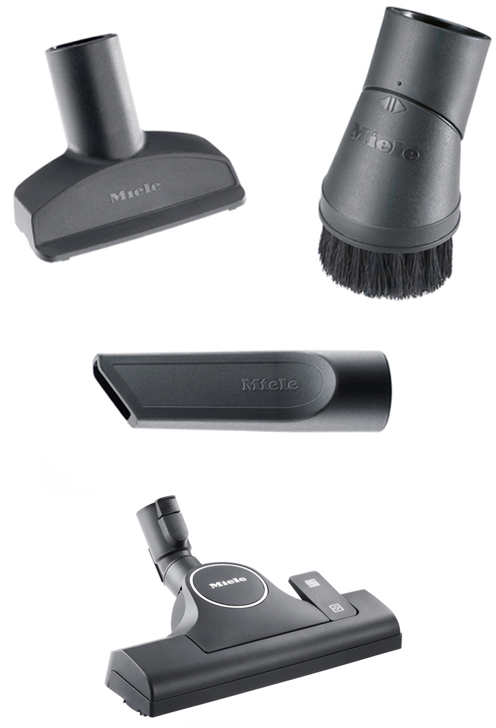 Four black vacuum cleaner attachments on white, including a brush head and nozzle.
