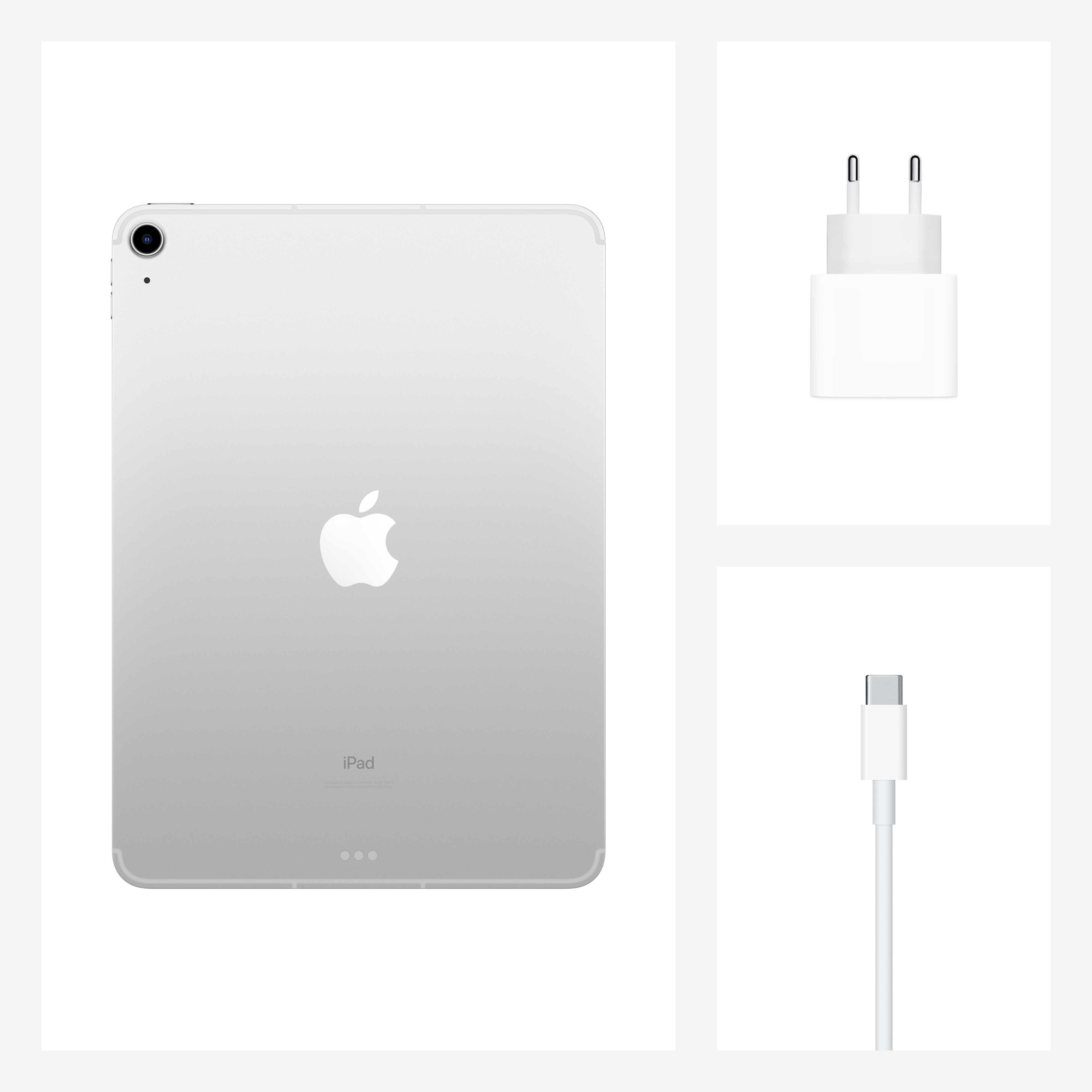 Un iPad plateado con un cargador y un cable sobre un fondo blanco. El logo de Apple está presente.