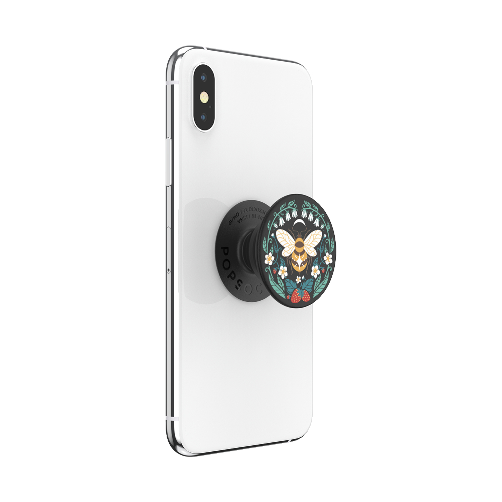 Weißes Telefon mit einem PopSocket im Bienen-Design. Der PopSocket ist schwarz und hat ein Bienen-Artwork.