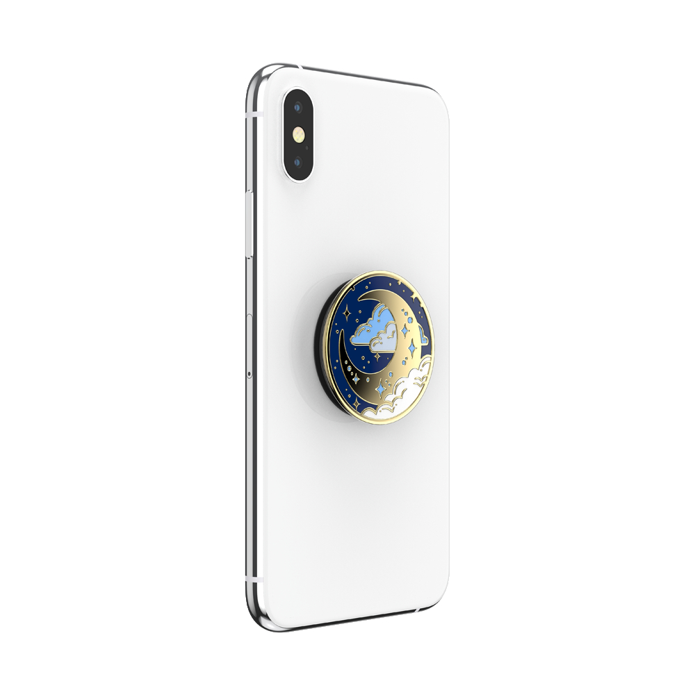 Ein weißes Telefon mit einem angebrachten Pop-Socket. Der Socket ist marineblau, gold mit Mond- und Sterndesign.