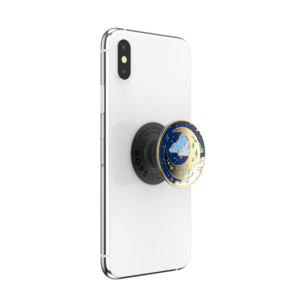 Weißes Telefon mit schwarzem PopSocket. Der PopSocket hat Mond-Design.