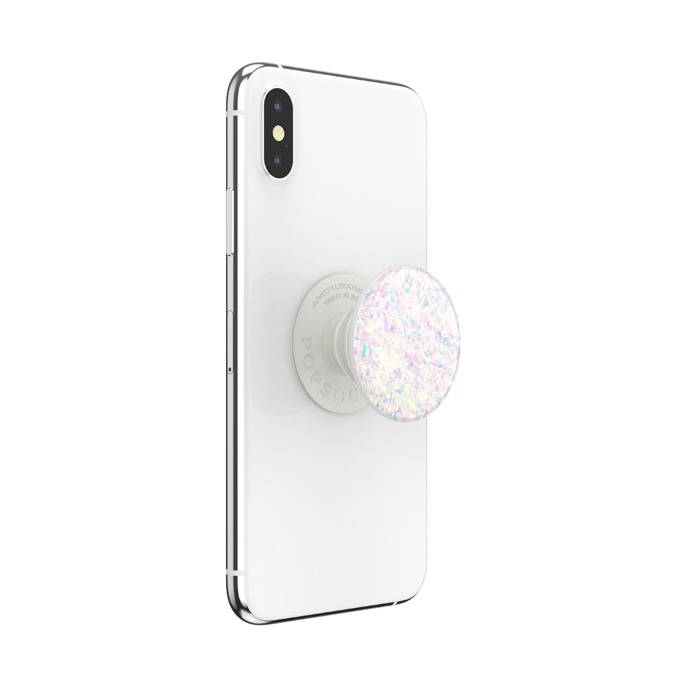 Ein weißes Telefon mit einem glitzernden Popsocket. Das Telefon ist auf weißem Hintergrund.