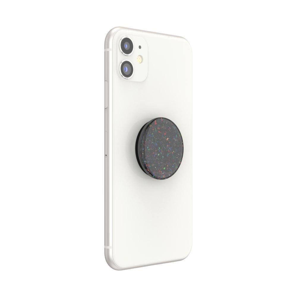 Weißes Telefon mit einem schwarzen und farbenfrohen Pop-Socket, auf weißer Oberfläche.