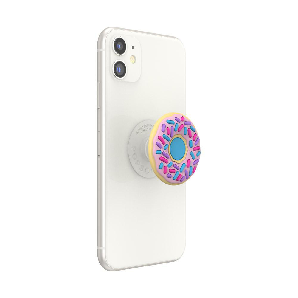 Weißes Telefon mit Donut-PopSocket. Der Donut hat rosa, blau und gelbes Frosting.