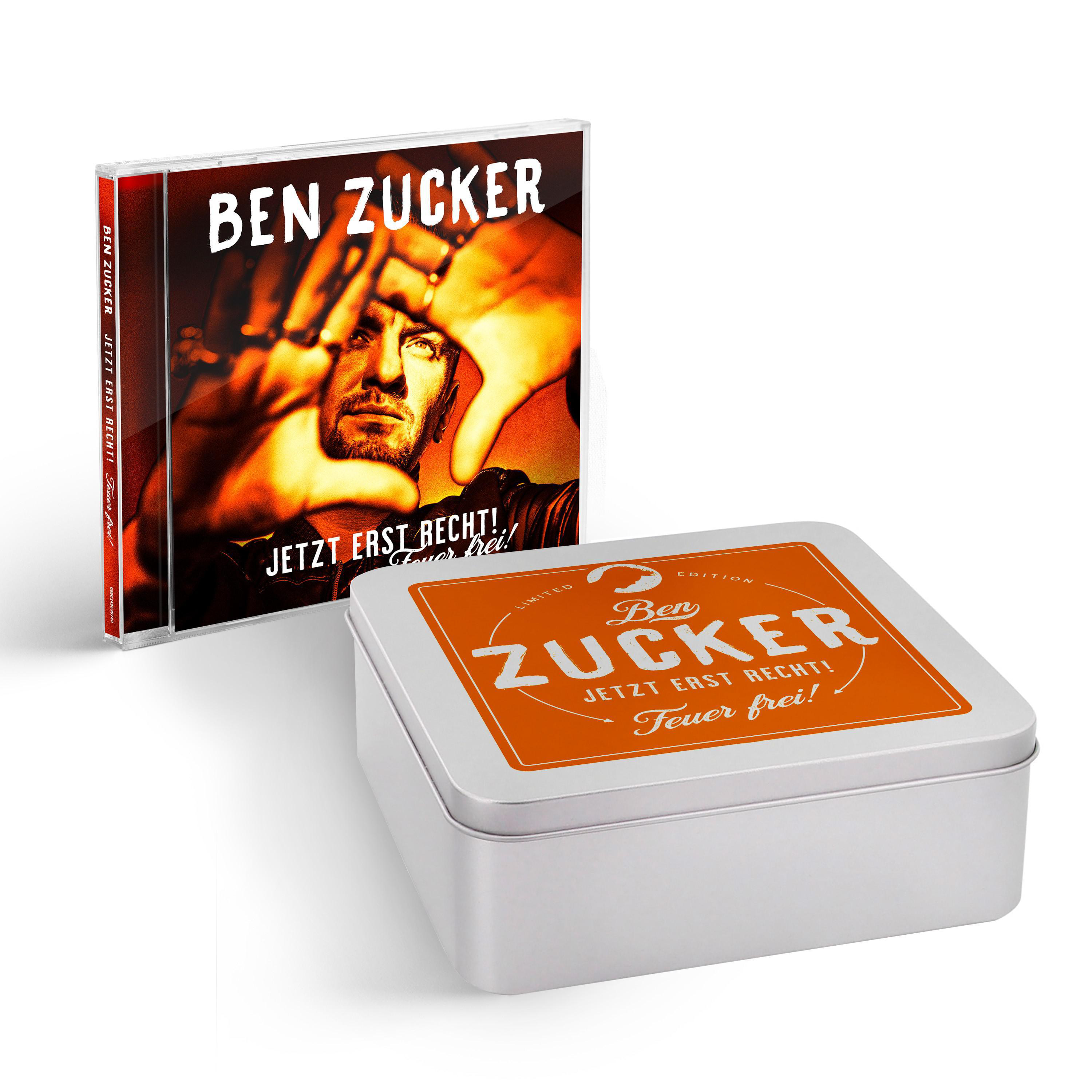 CD und eine quadratische Metallbox von Ben Zuckers Album, mit Text und Bild auf der Hülle.