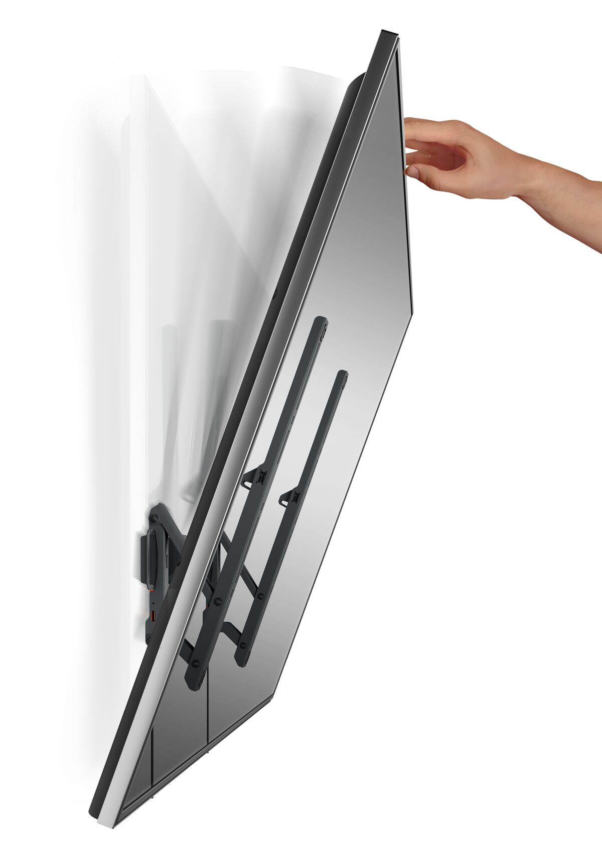 A person's hand adjusting a large, flat-screen television mounted on a white wall.