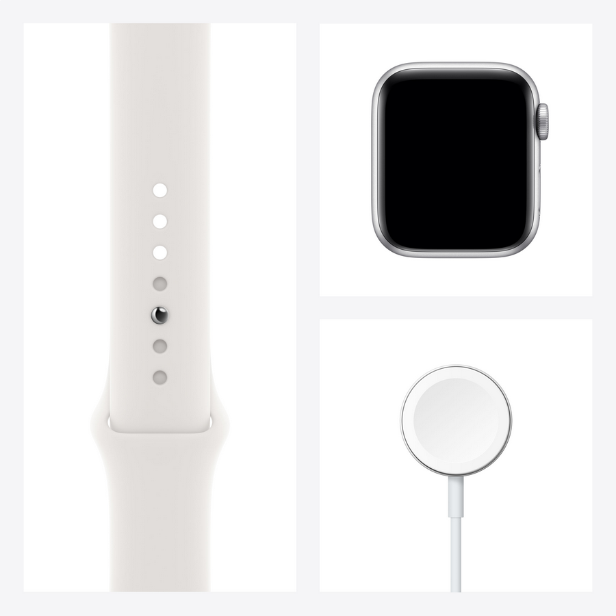 Apple Watch blanca con correa blanca, cargador y esfera.
