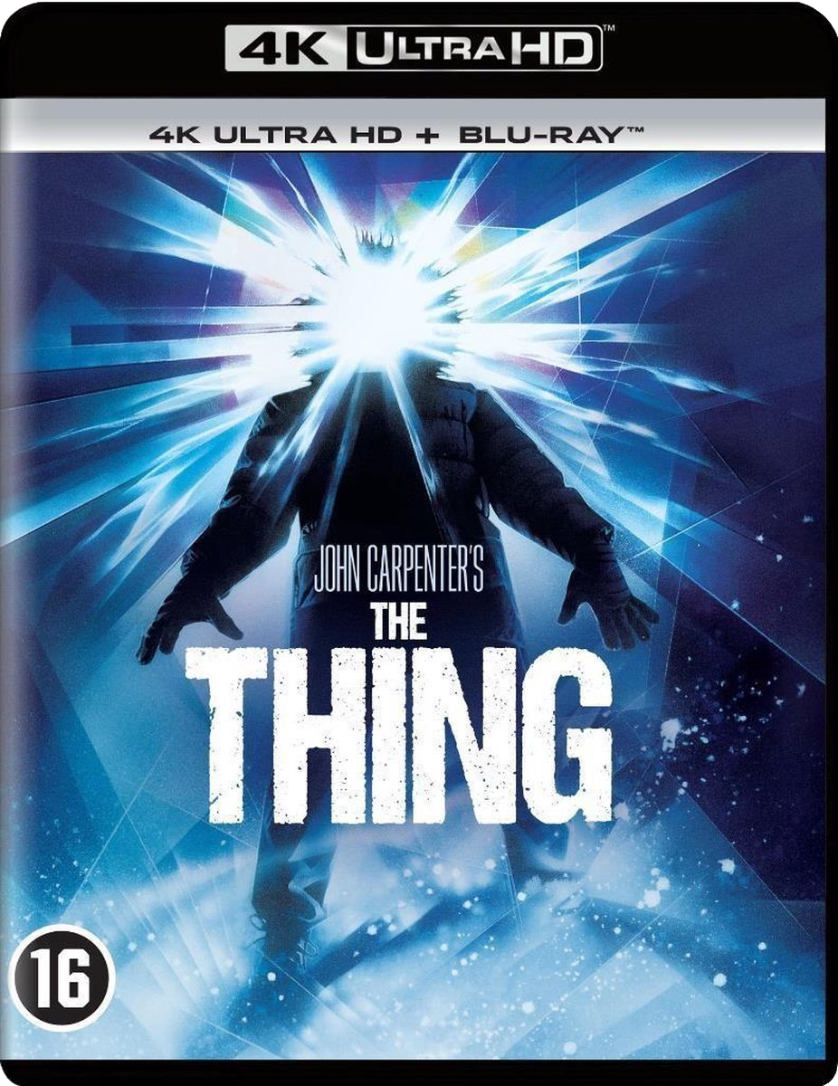 The Thing 4K Ultra HD Blu-ray. Visage de l'homme brillant. Fond bleu et blanc.
