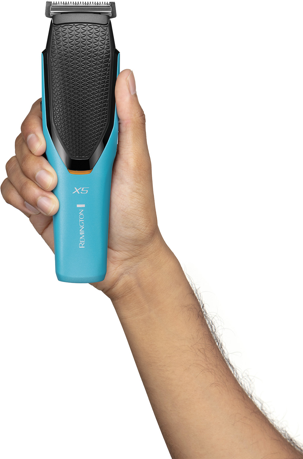 Hand holding a turquoise Remington X5 beard trimmer.