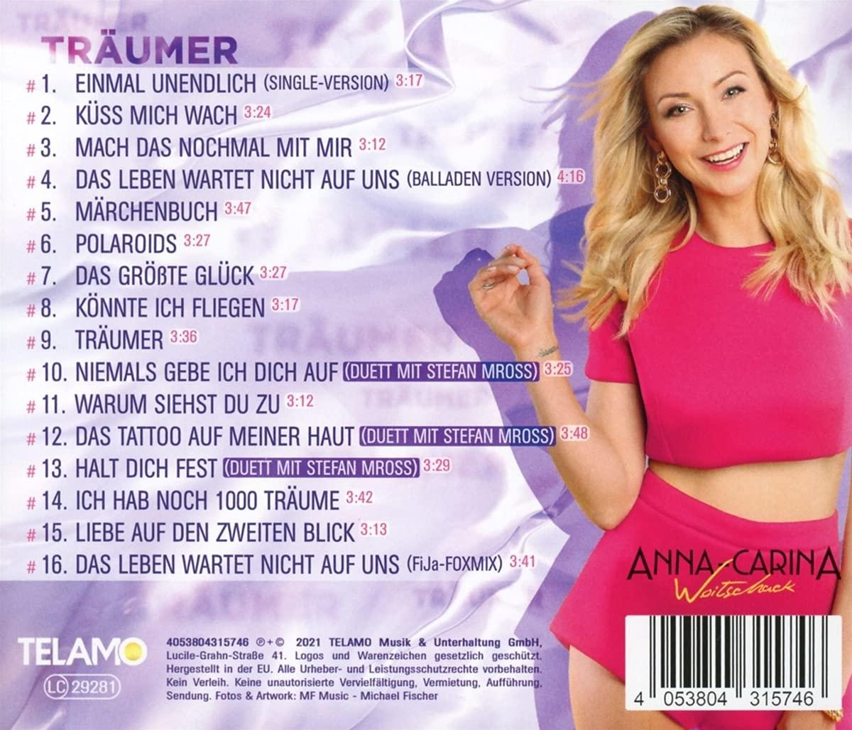 Albumcover mit Frau in rotem Top und Titelliste. Enthält Barcode und Albumtitel Träume.