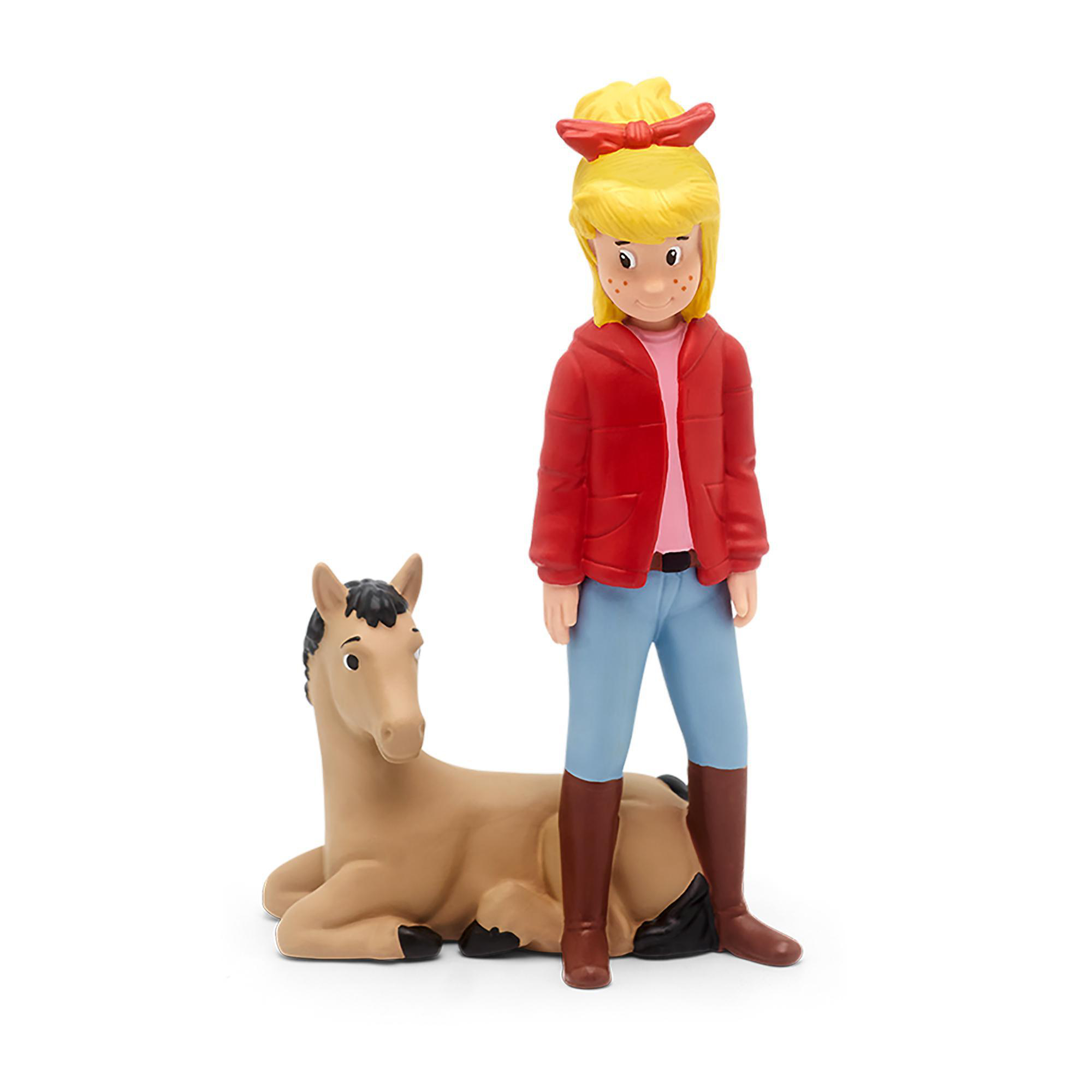 Eine Kinderfigur mit roter Jacke und blauer Hose steht neben einer liegenden Pferdfigur.