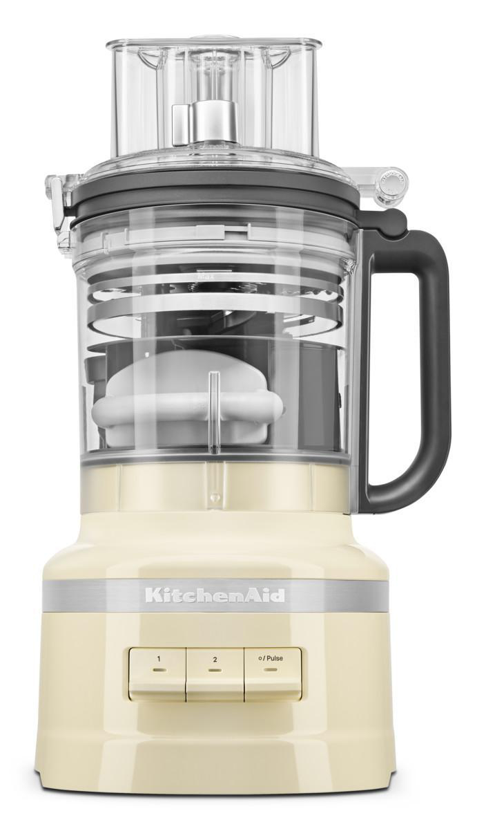KitchenAid-Küchenmaschine, cremefarben, mit transparenter Schüssel und schwarzem Griff.