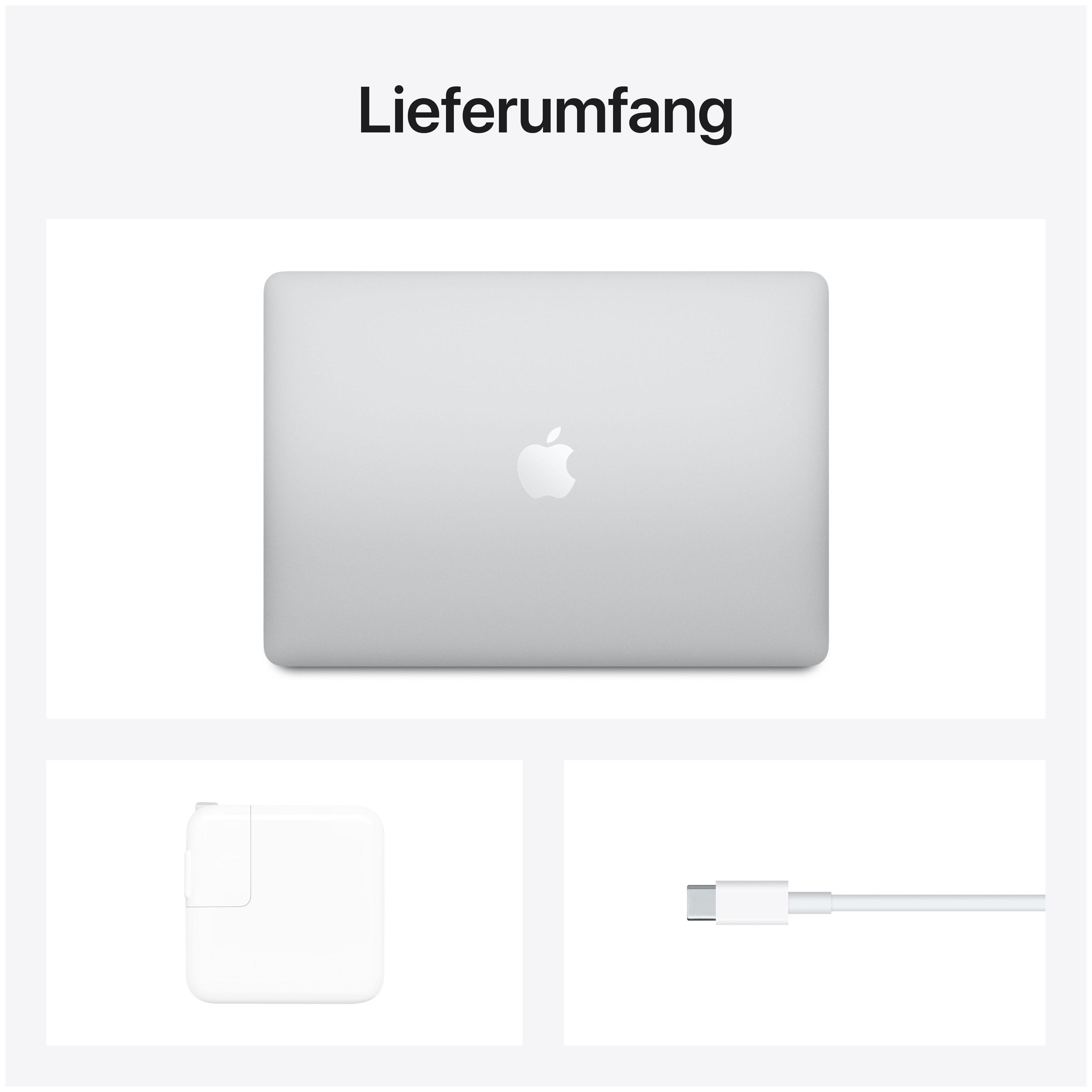 Draufsicht auf einen silbernen Laptop mit Apple-Logo, Ladegerät und Kabel auf weißem Hintergrund.