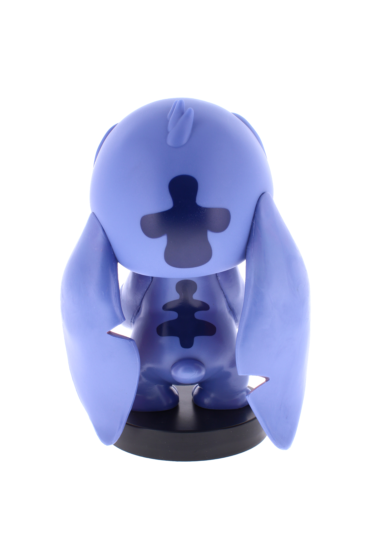 Eine blaue Stitch-Figur, Rückansicht. Die Figur hat große Ohren und einen dunkelblauen Fleck auf dem Rücken.