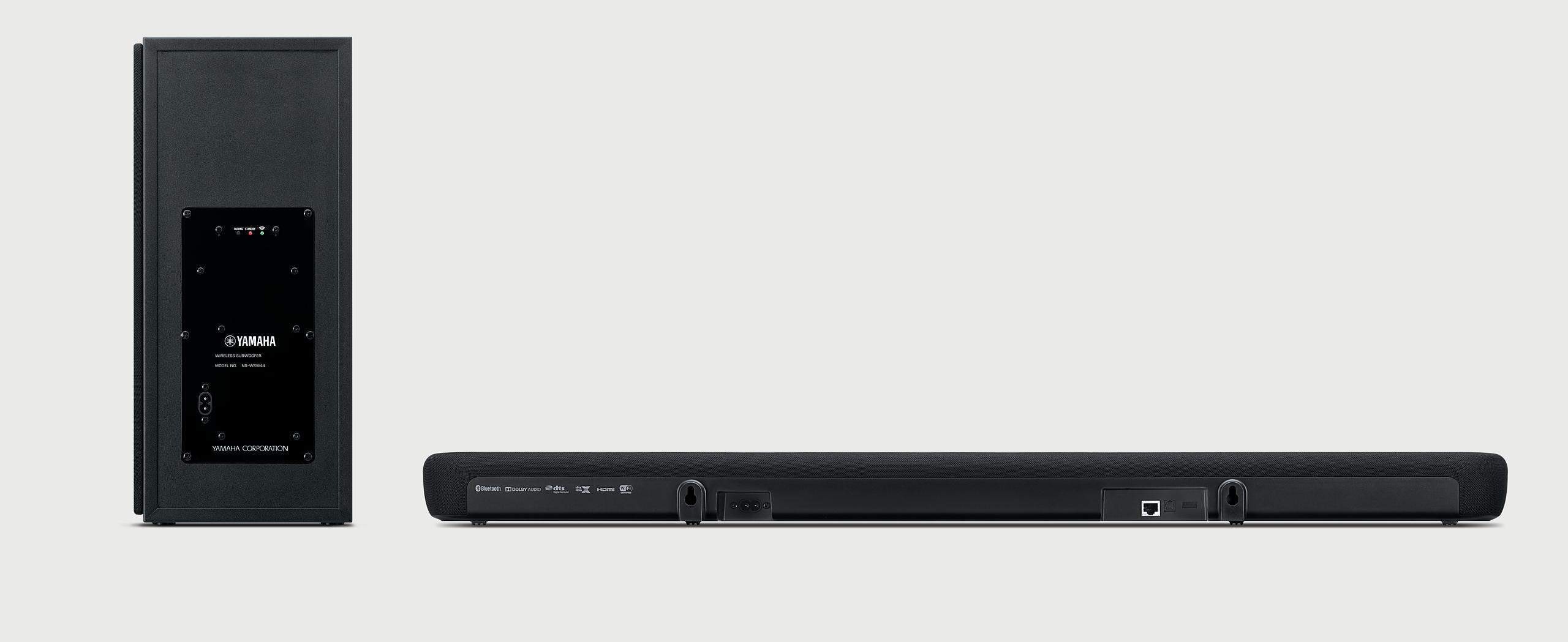 Schwarze Yamaha Soundbar und Subwoofer. Die Soundbar ist lang und horizontal.