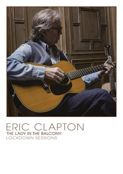 Eric Clapton jouant de la guitare, assis. Texte : 'The Lady in the Balcony: Lockdown Sessions'.