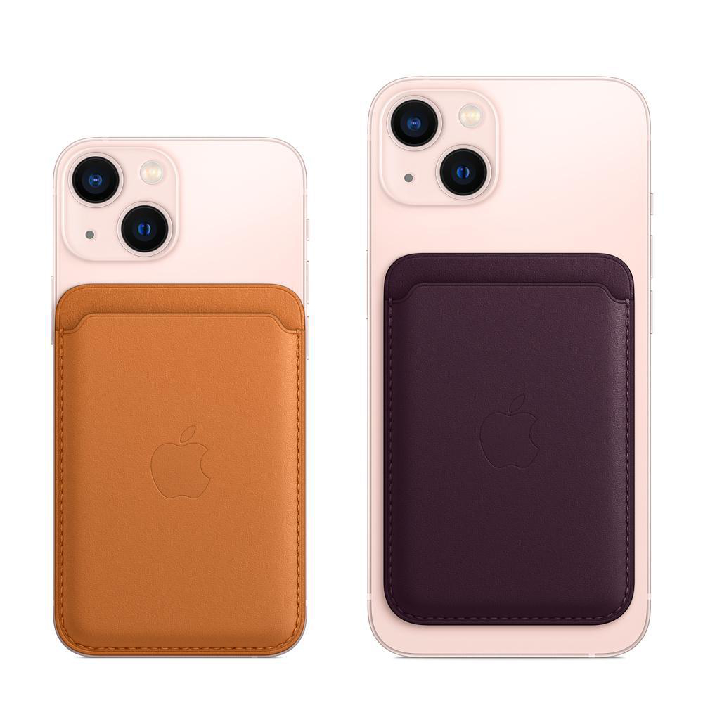 Zwei iPhones mit MagSafe-Geldbörsen. Einmal orange, einmal lila, beide mit Apple-Logo.