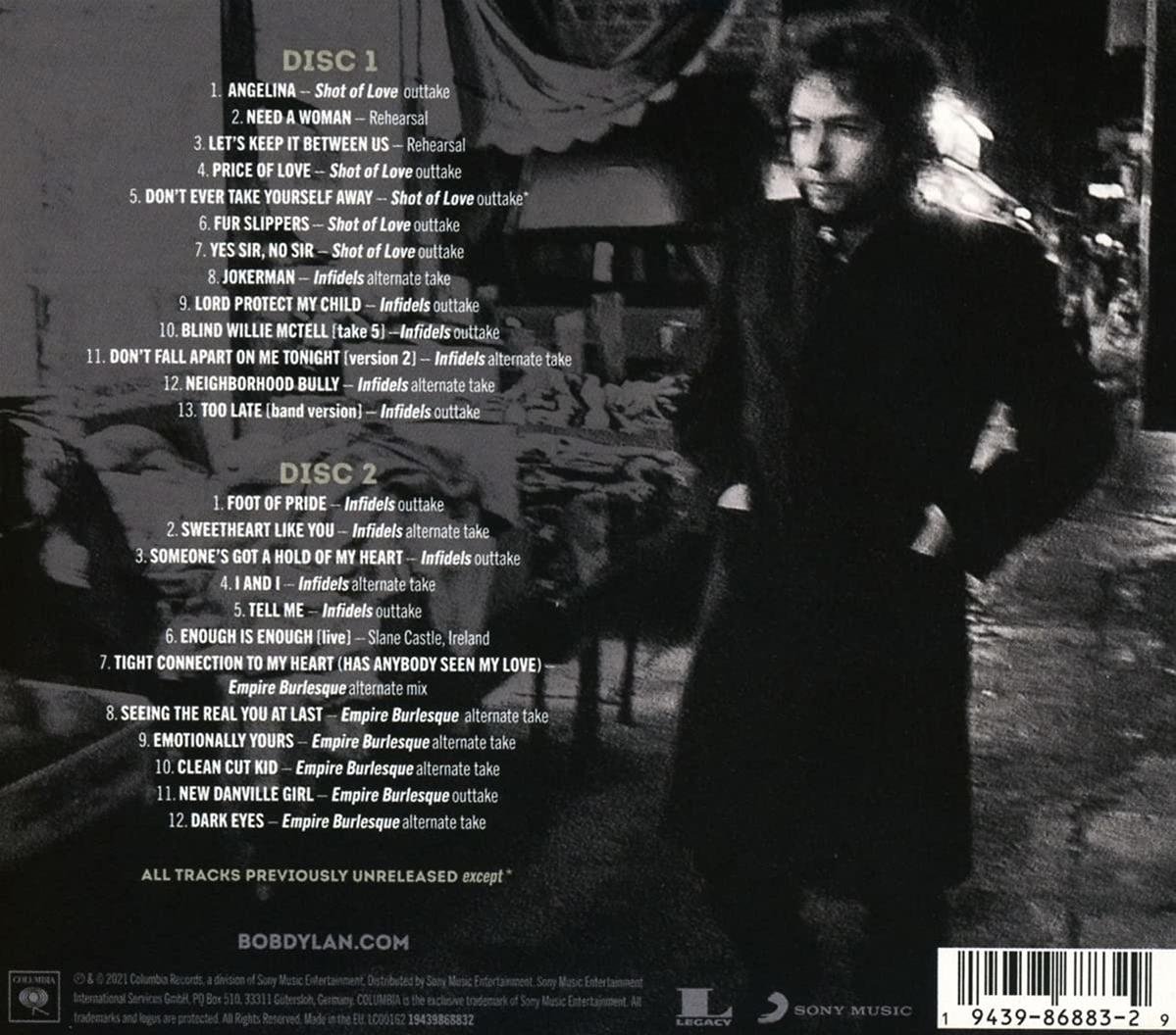 Albumcover mit Text und einem Foto von Bob Dylan in einem dunklen Mantel und Hut.