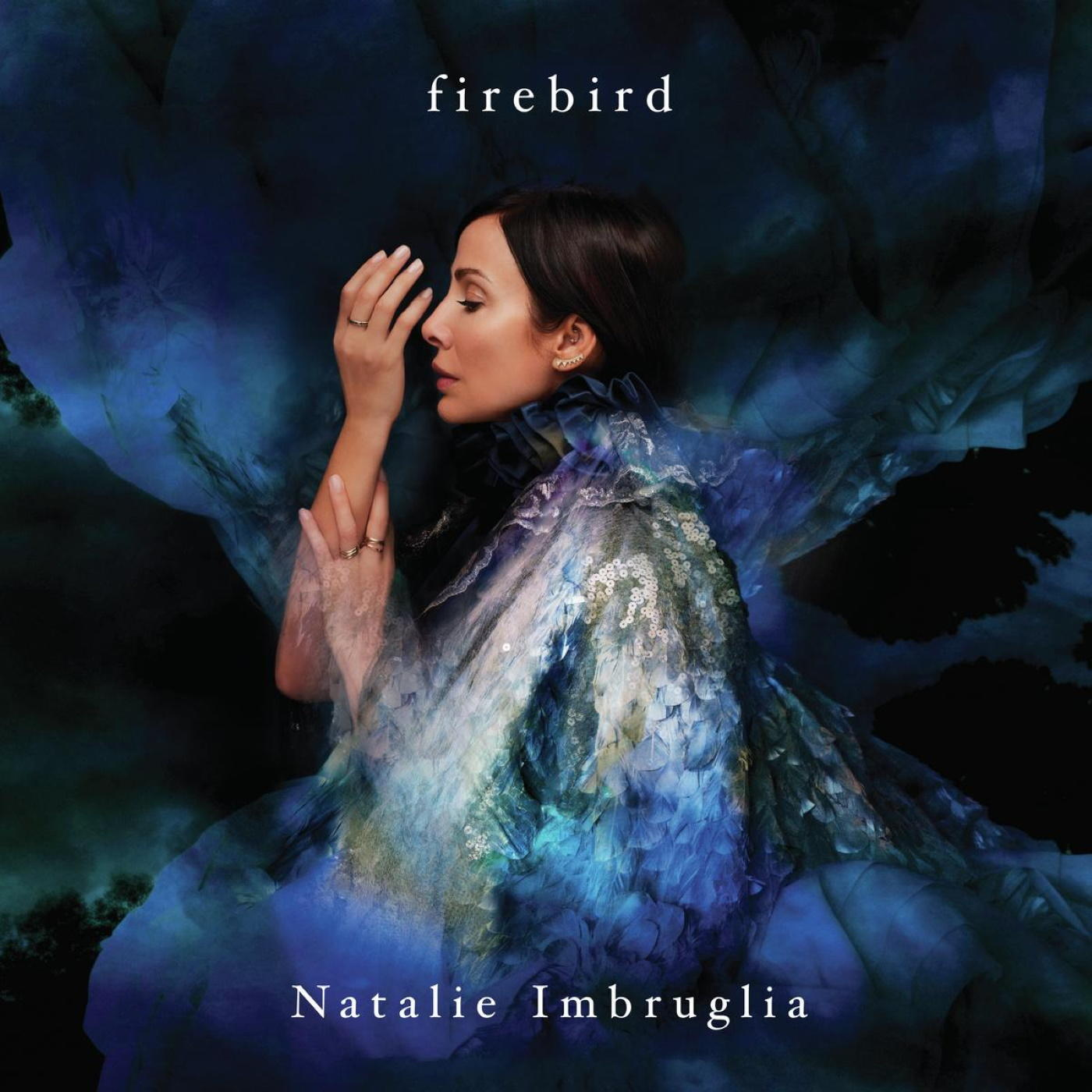 Album borító, Natalie Imbruglia, kék ruhában, felül a "firebird" címmel.