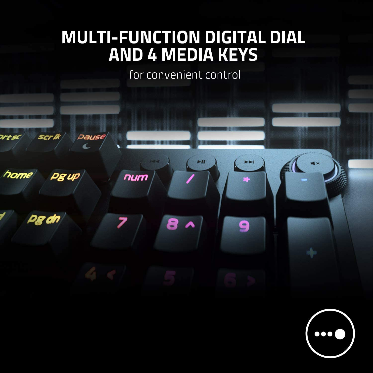 Primer plano de un teclado con teclas multimedia. Las teclas son negras, con luces moradas y rosas iluminadas.