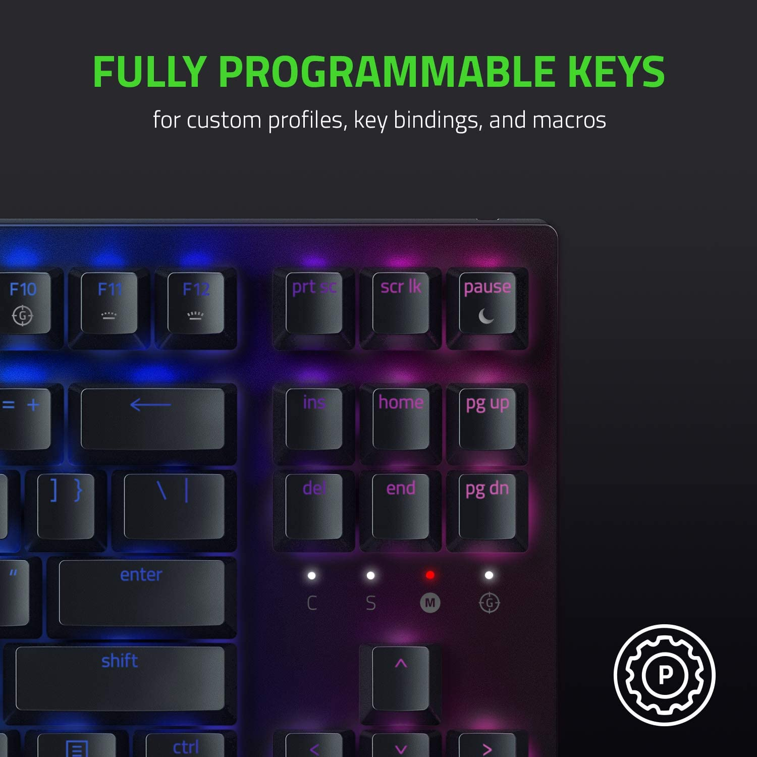 Teclas del teclado. La imagen es un primer plano y muestra teclas con retroiluminación. La palabra "PAUSE" es visible.