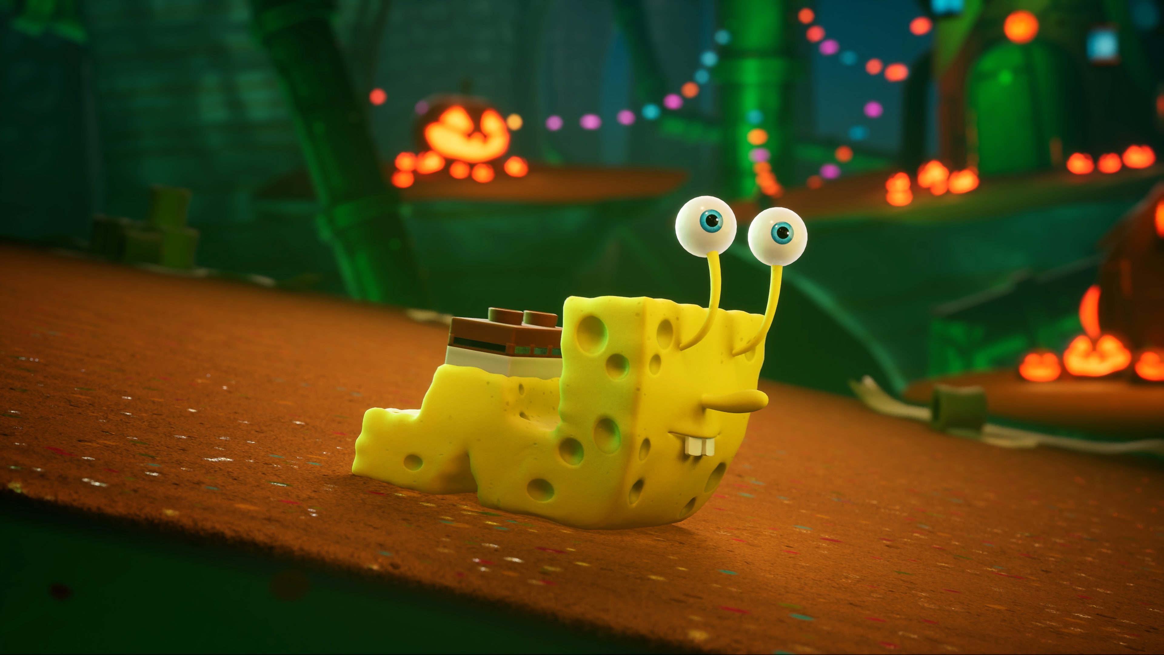 SpongeBob Schwammkopf-Figur in einem Schneckenkostüm auf braunem Untergrund.