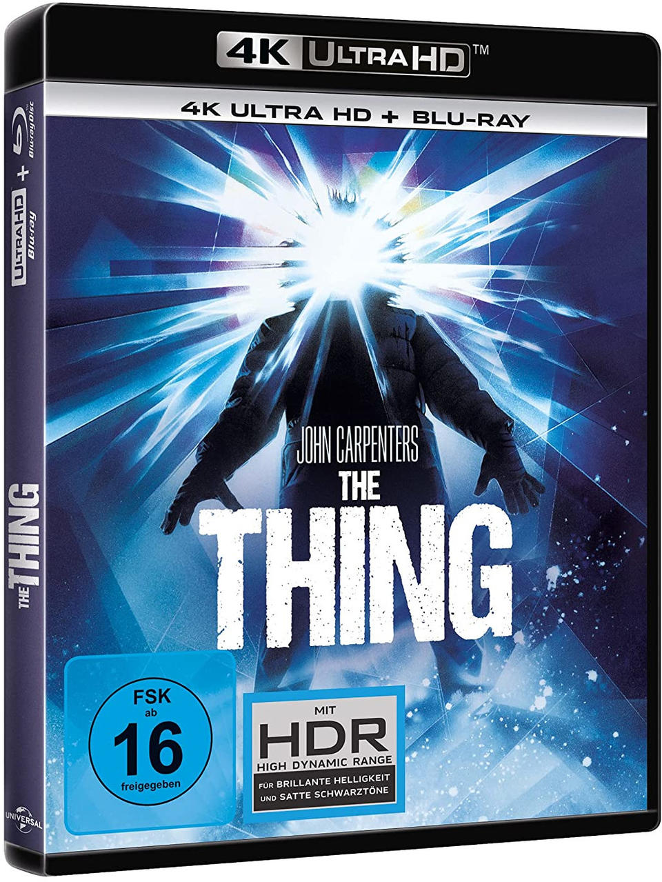 Das Ding-Filmcove. Eine Person wird von einem hellen Licht vor blauem Hintergrund beleuchtet.