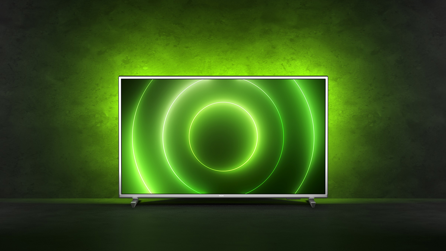 Een tv-scherm met groene concentrische cirkels op een donkere achtergrond.