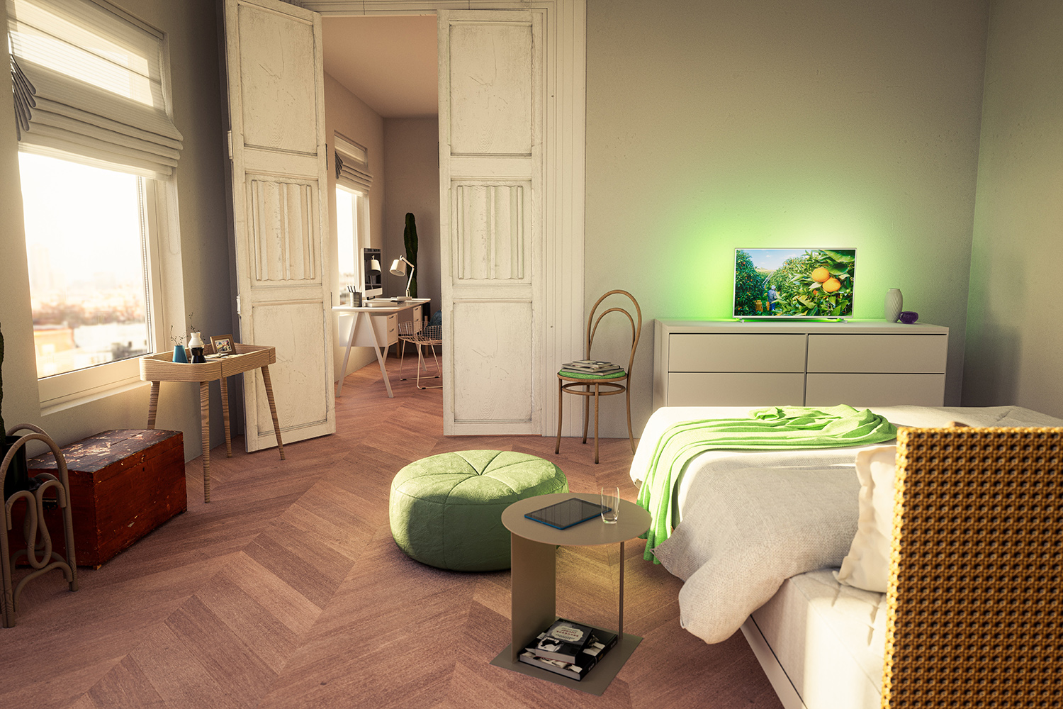 Interieur van een slaapkamer met groene verlichting op de tv en een bed.