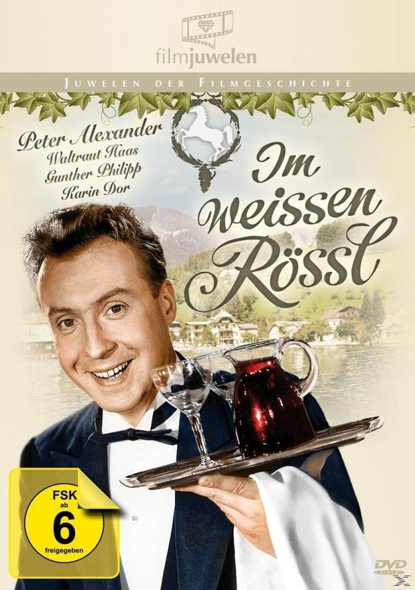 Filmplakat 'Im weißen Rössl'. Mann lächelt, hält Tablett mit Gläsern und Kanne mit roter Flüssigkeit.
