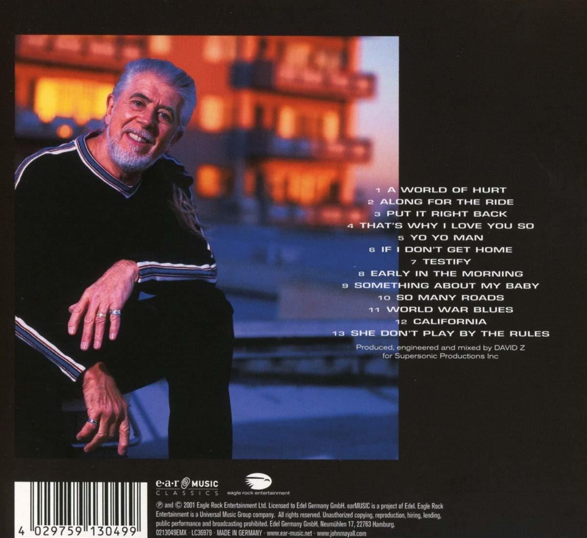 Mann in schwarzem Pullover mit weißem Bart, lächelnd. Albumcover mit Text rechts.