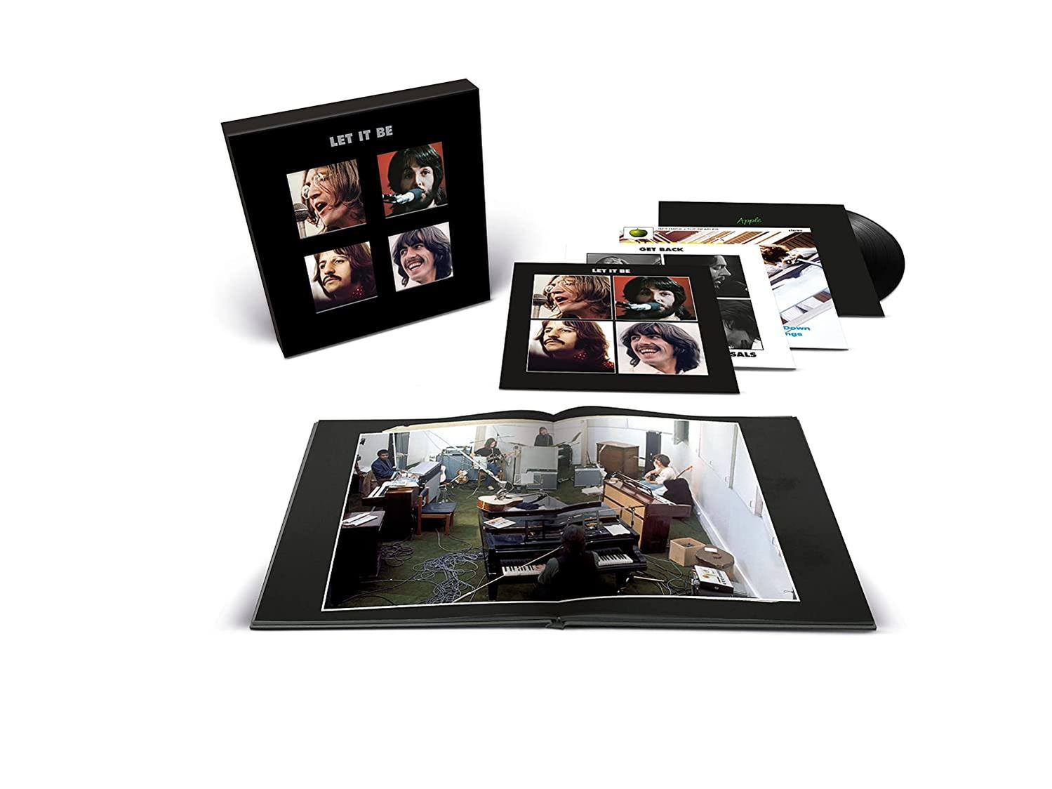 The Beatles 'Let It Be' album díszdoboz kinyitva, zenekari fotókkal és bakelitlemezekkel.