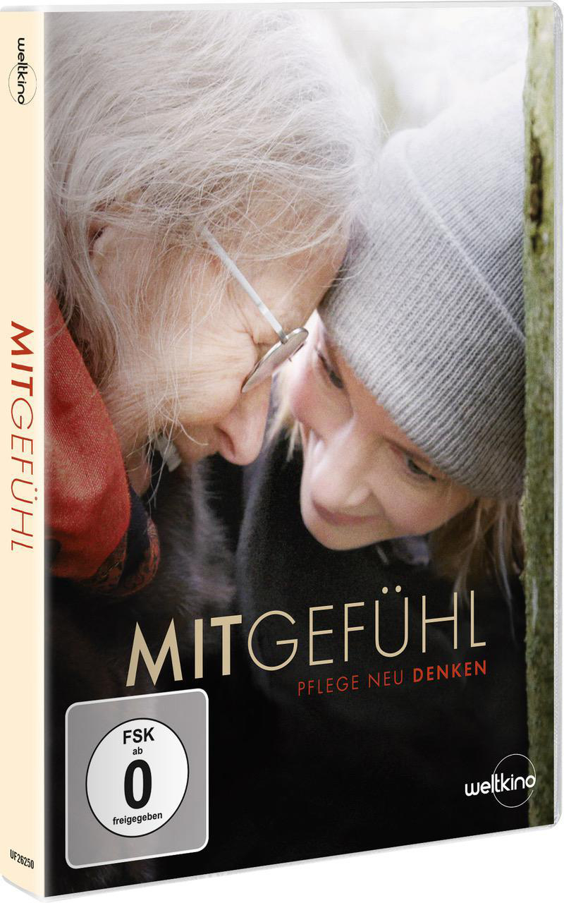 DVD-Cover. Zwei Frauen, eine ältere, umarmen sich. Titel: Mitgefühl. Text: Pflege neu denken.