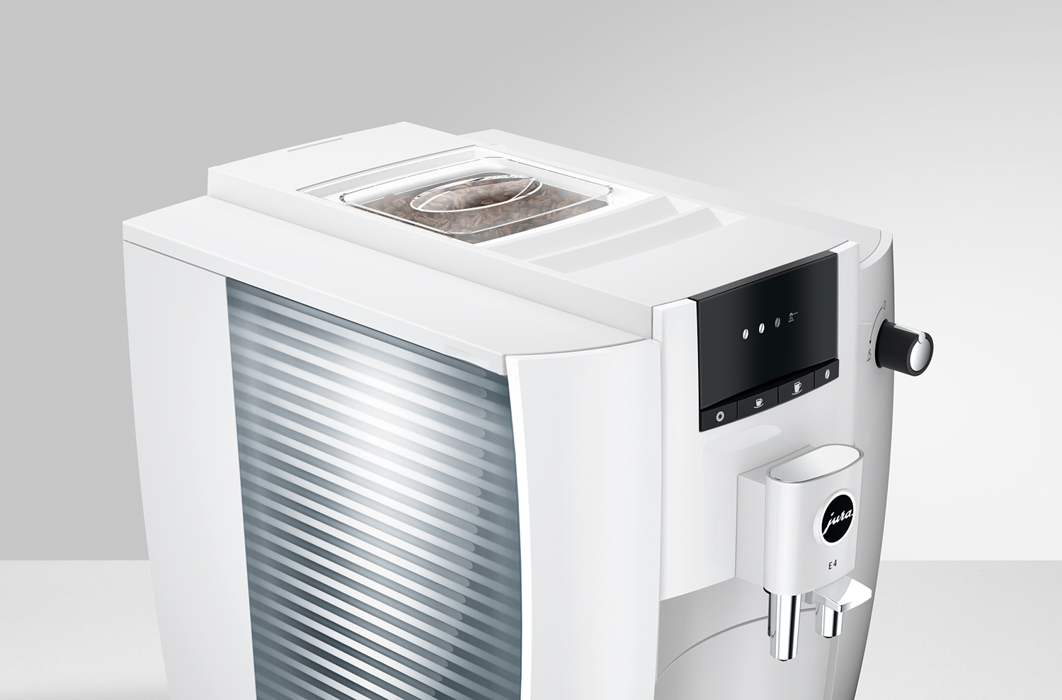 A white coffee machine with a bean container and a control panel.