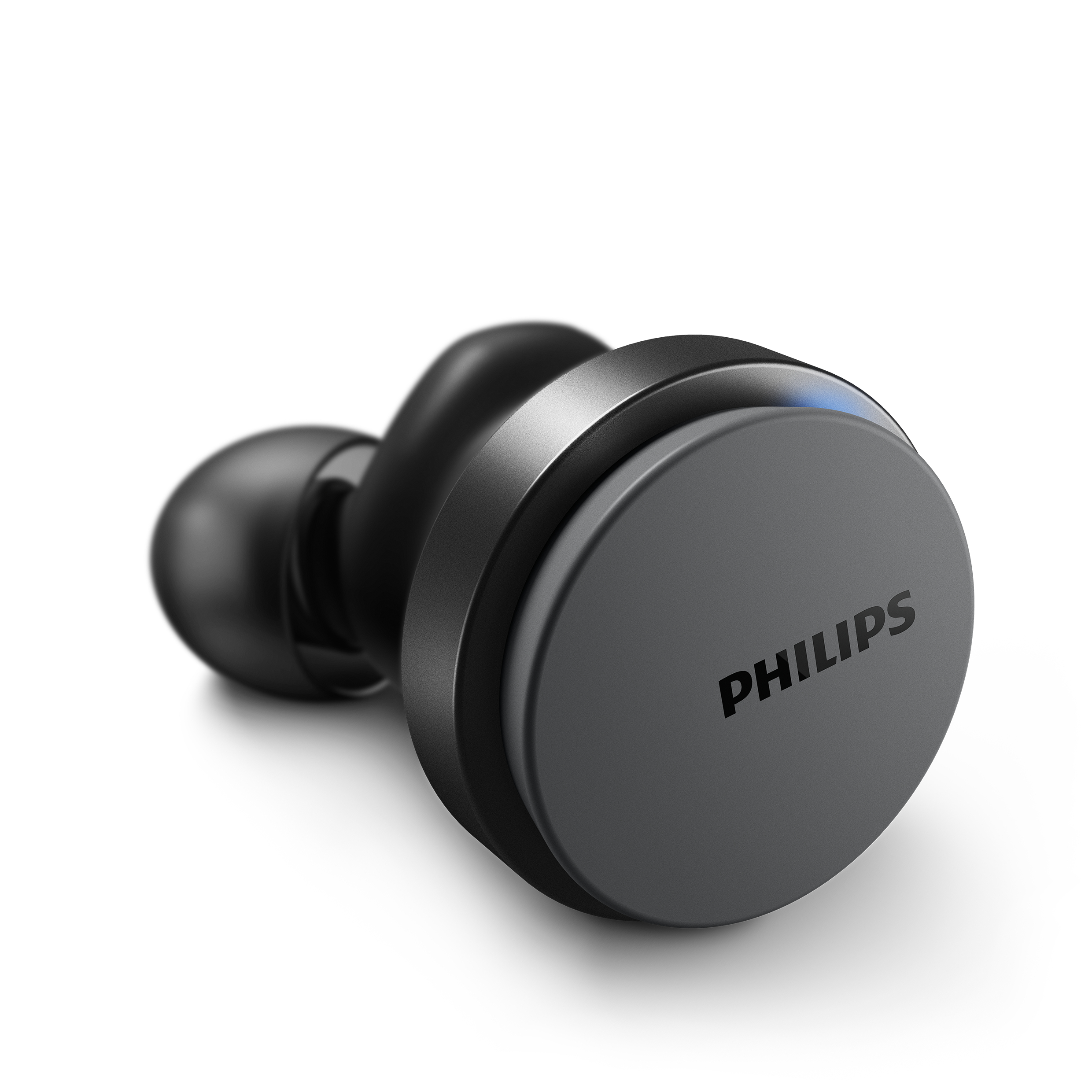 Einzelner schwarzer Ohrhörer mit grauem Philips-Logo. Weißer Hintergrund.