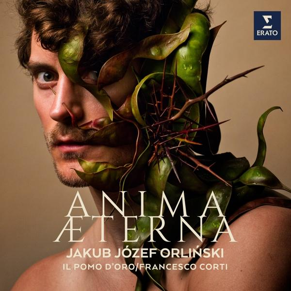 Az 'Anima Aeterna' album borítója Jakub Józef Orlińskivel, zöld lombozattal díszítve.