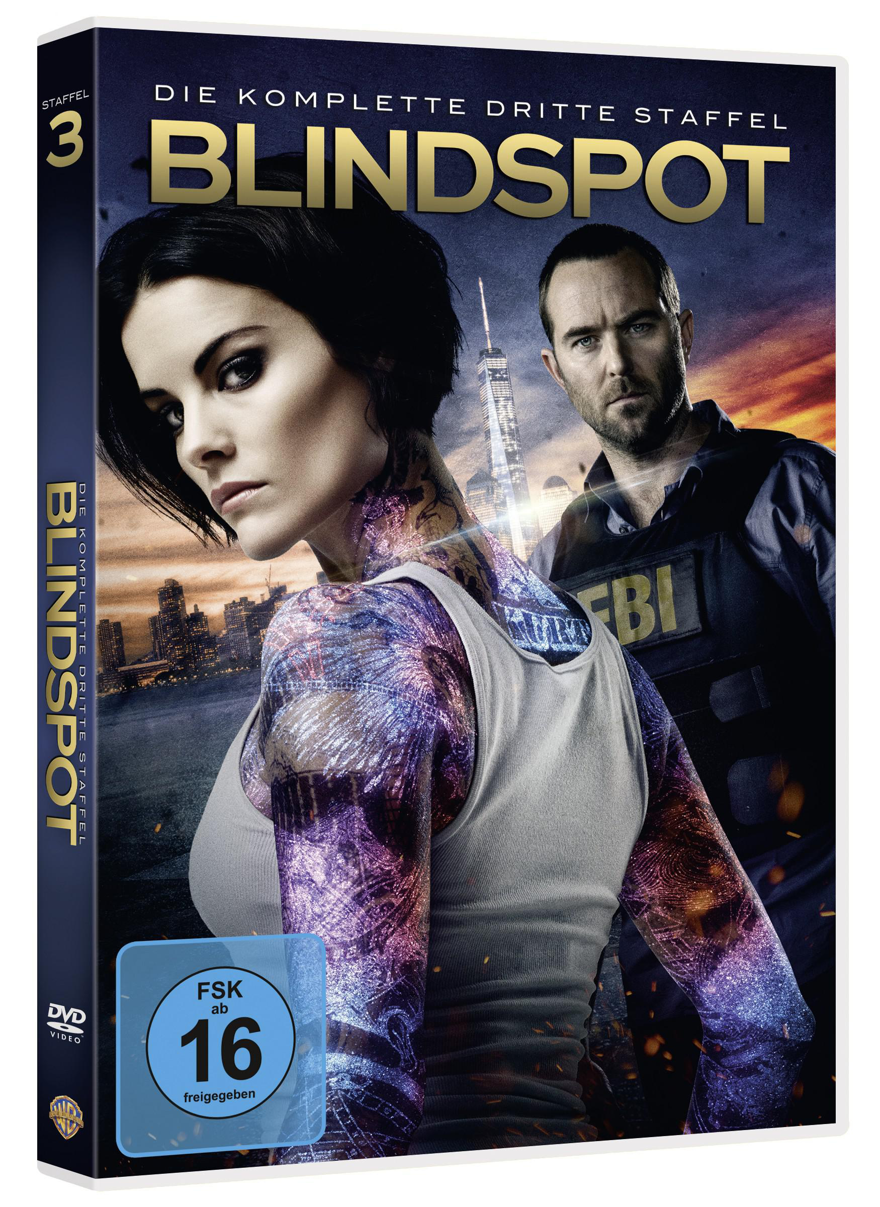 DVD-Cover für die Serie 'Blindspot'. Frau mit Tätowierungen und Mann im Hintergrund.