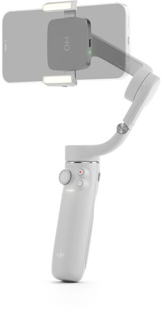 Weißer Telefonstabilisator mit angebrachtem Telefon, auf weißer Oberfläche.