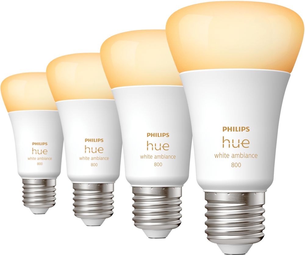 Quatre ampoules Philips Hue white ambiance. Elles sont blanches avec une lueur jaune.