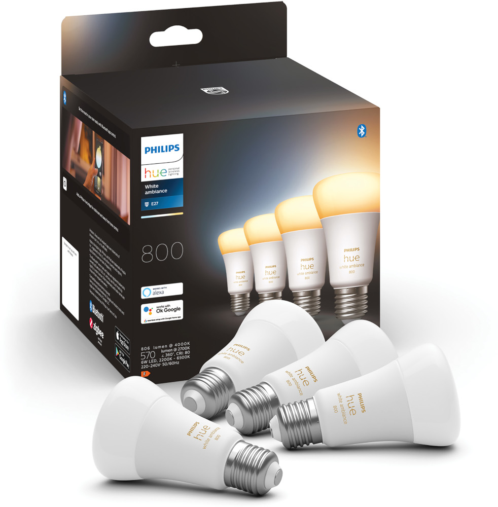 Un ensemble d'ampoules intelligentes Philips Hue avec une boîte, montrant les ampoules et l'emballage sur fond blanc.