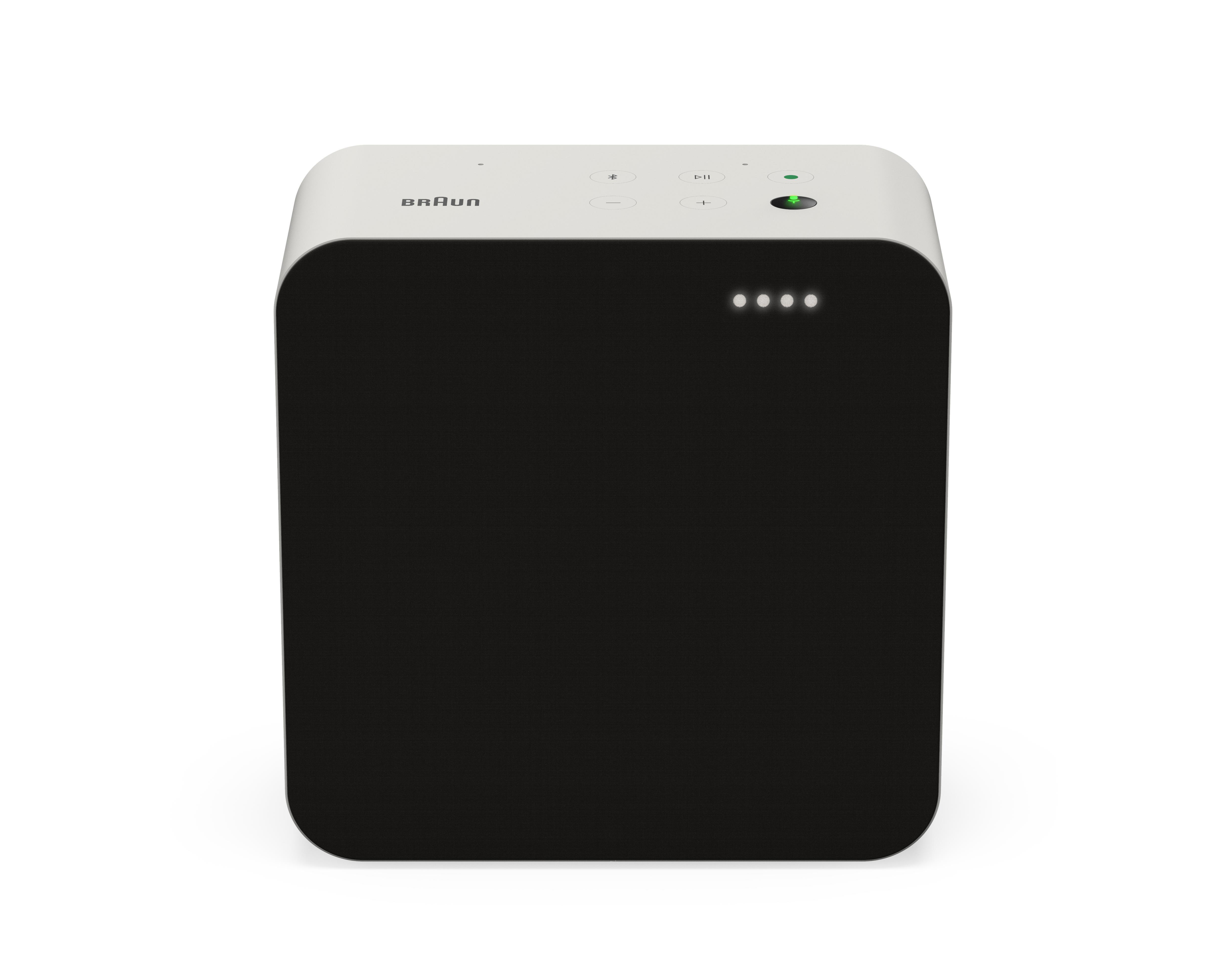 Ein weißes und schwarzes Braun-Lautsprechergerät, isoliert auf weißem Hintergrund.