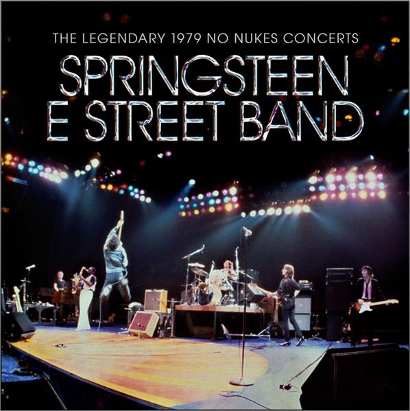 Springsteen & E Street Band sur scène. Photo de concert, public en arrière-plan.