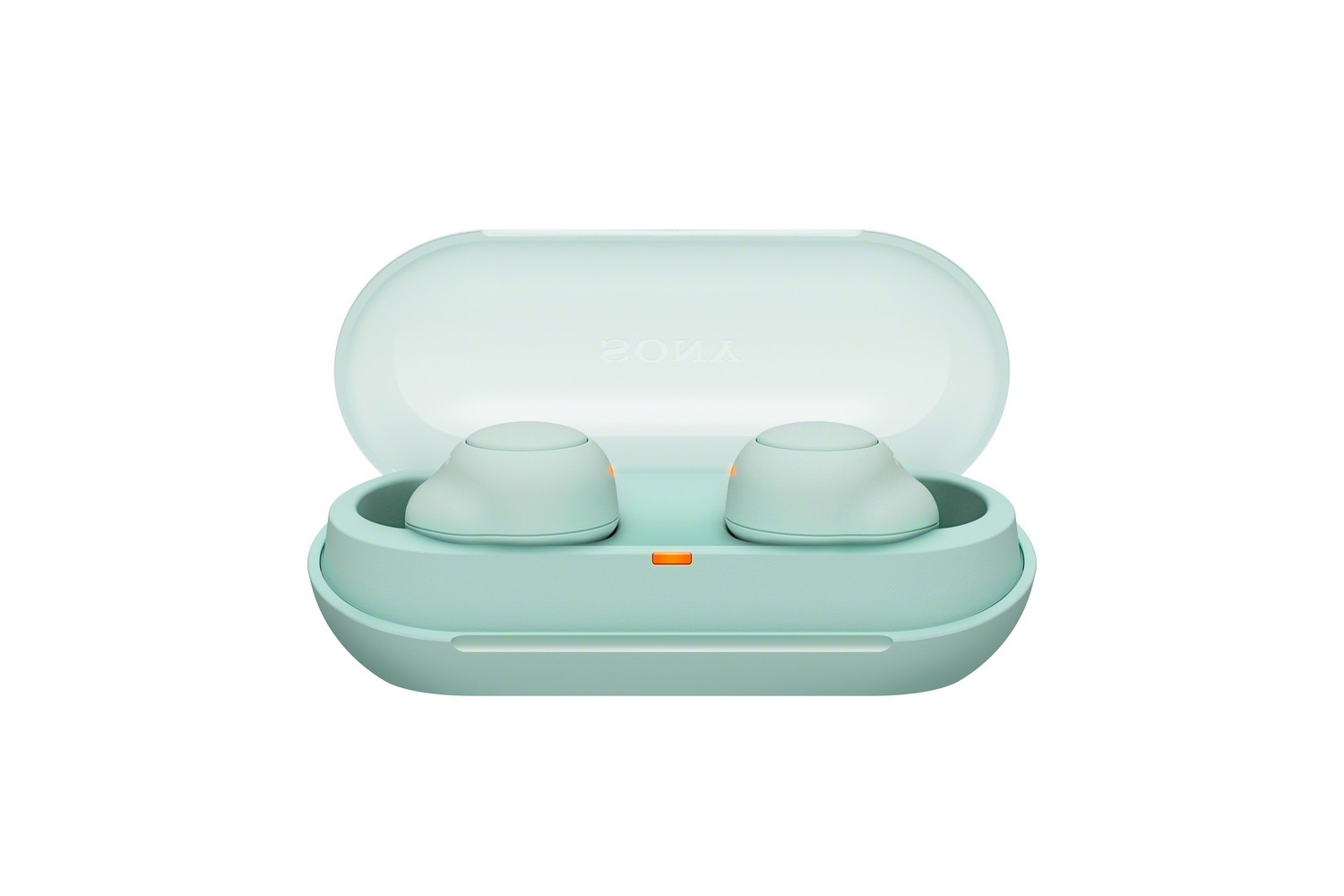 Un par de auriculares verde menta en un estuche de carga, aislado.