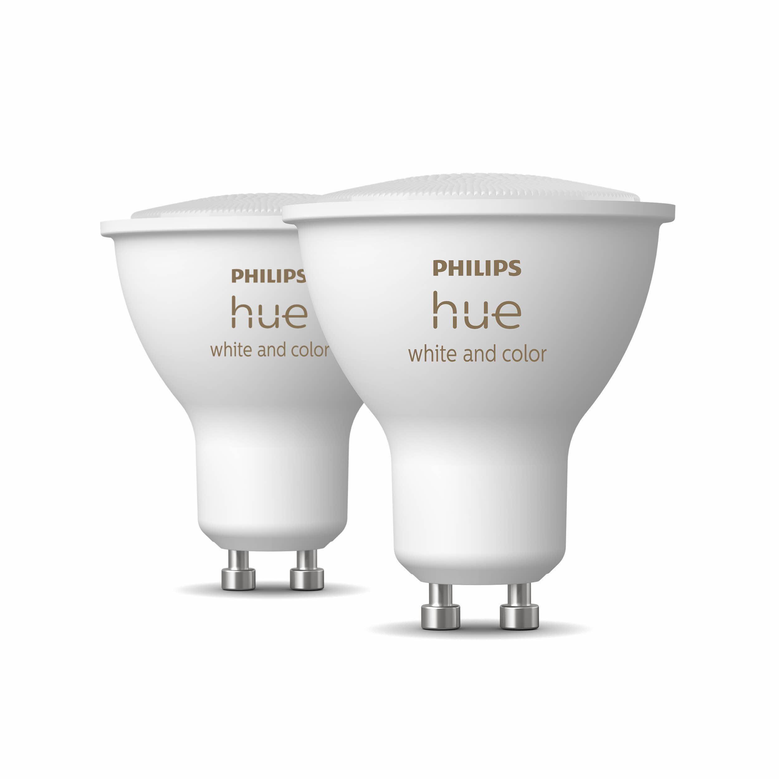 Zwei weiße Philips Hue Glühbirnen mit sichtbarem Markennamen, vor weißem Hintergrund.
