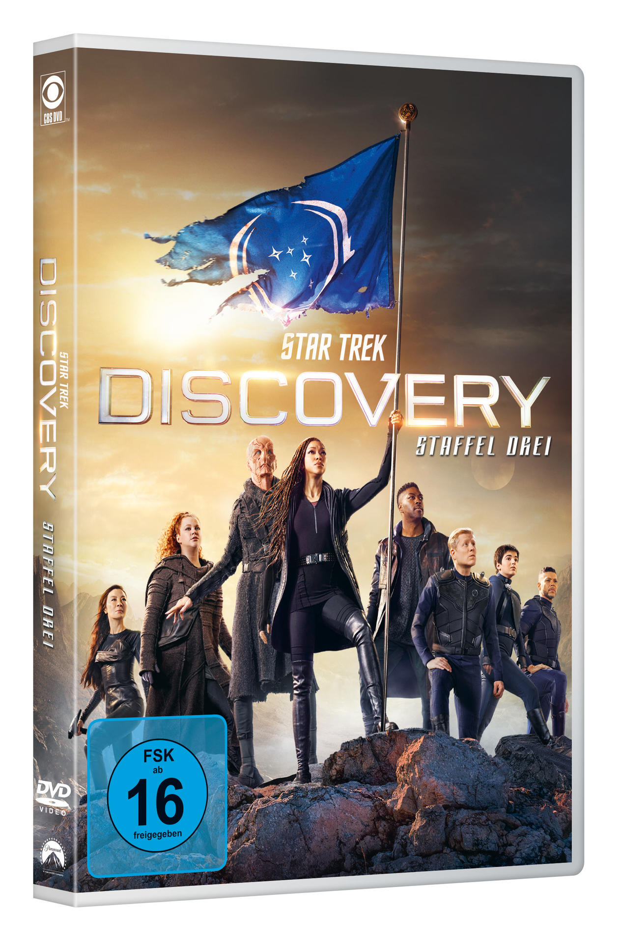 DVD-Box mit stehenden Personen, blauer Flagge und Text.