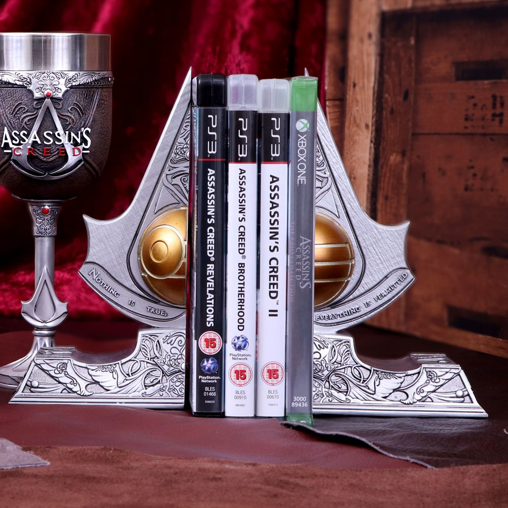NEMESIS NOW Assassin's Creed - Edenapfel - Buchstützen (Silber/Gold/Schwarz)