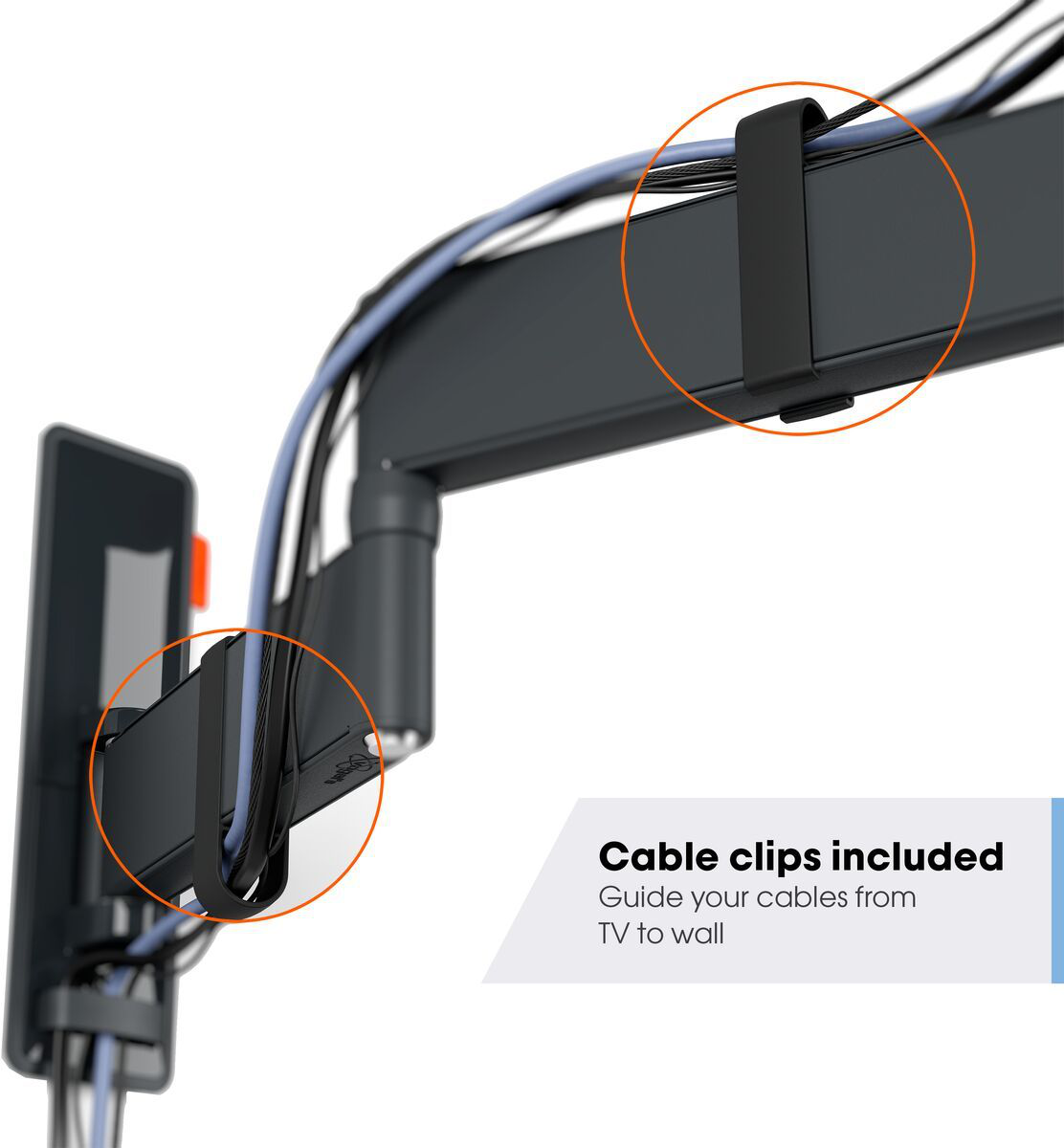 Nahaufnahme von Kabelclips, die an einer schwarzen TV-Halterung befestigt sind. Kabel sind ordentlich organisiert.